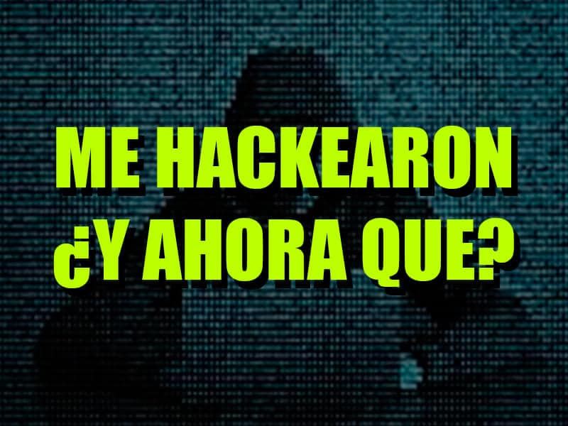 hacker escondido tras una capucha hackea una web